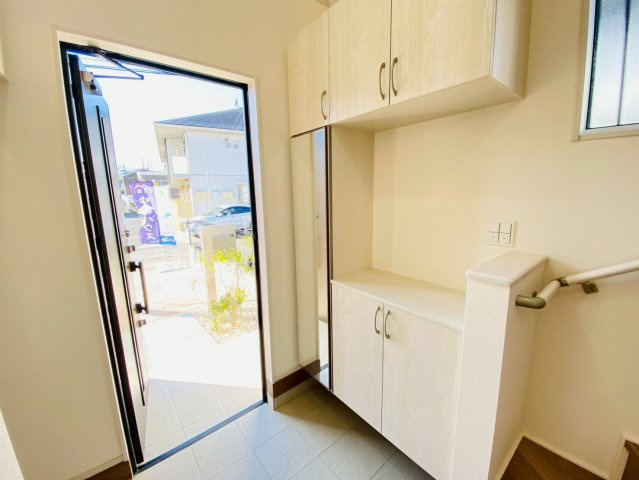 ブルーミングガーデン／北区鶴羽田１丁目／１号棟の玄関