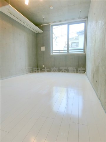 COCOFLATココフラット蒲田の居間・リビング|洋室