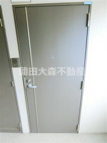 ヴォーガコルテ多摩川の玄関