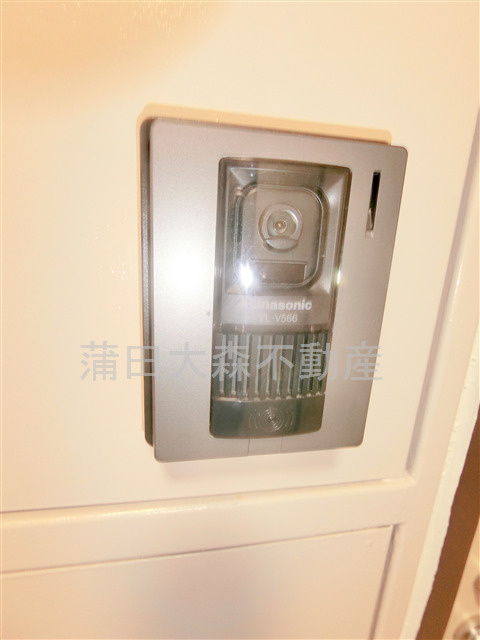 住建第7ハイプレースの玄関