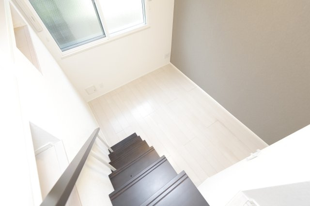 グランシャリオ金町の洋室