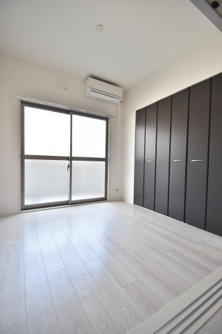 大阪市都島区都島南通２丁目の賃貸マンションの洋室