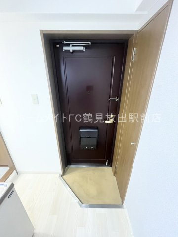 大阪市鶴見区今津中１丁目の賃貸マンションの玄関