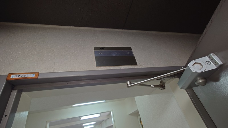 グローリア初穂平野の玄関