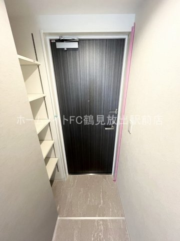 大阪市鶴見区今津中１丁目の賃貸マンションの玄関