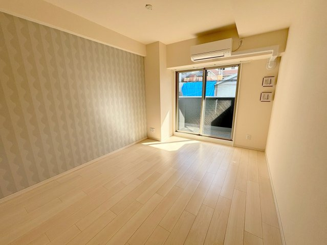 ファーストフィオーレ北大阪リアンの洋室