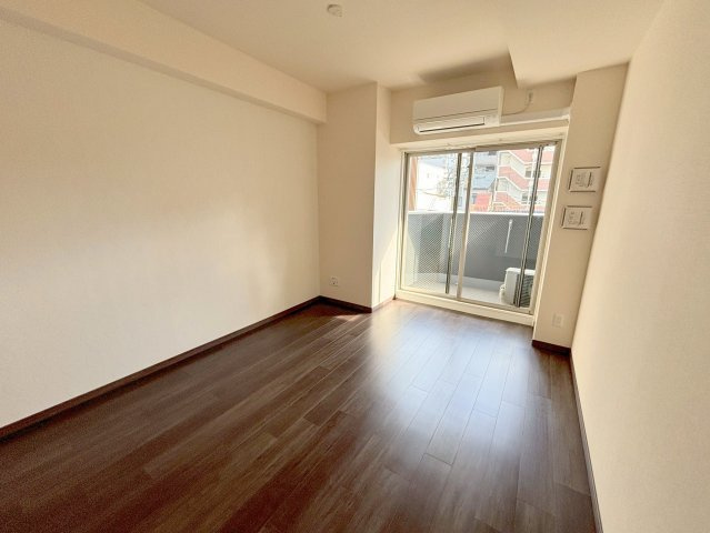 ファーストフィオーレ北大阪リアンの洋室