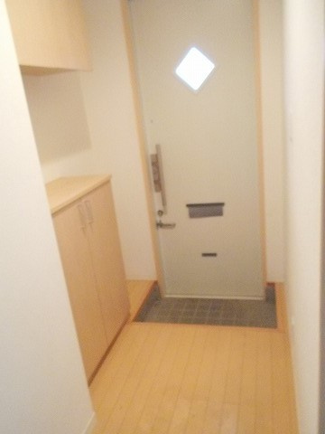 シャーメゾンきびじ Aの玄関