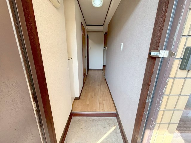 フローライト豊里1の玄関