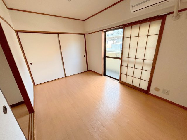 フローライト豊里1の寝室