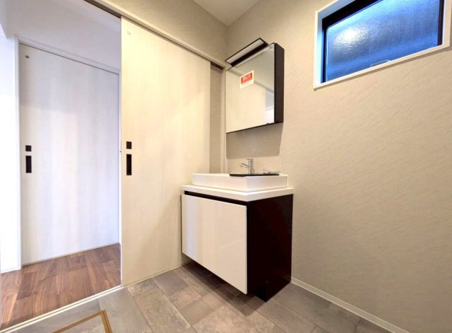 高知市鴨部　新築一戸建て（西棟の洗面所|洗面台もこだわりの仕様。