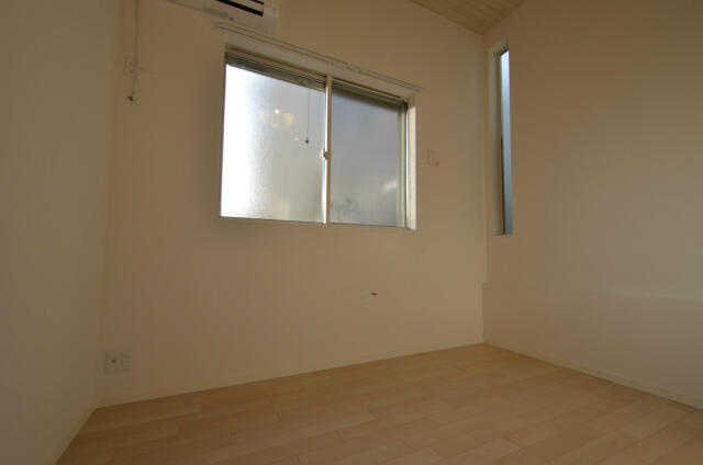 アザーレ・パッシオ生田壱番館の居間・リビング