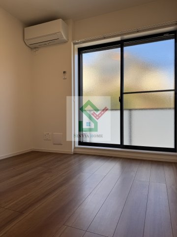 小手指駅　新築アパートの寝室