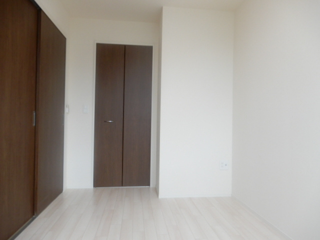 明石市魚住町清水のアパートの寝室