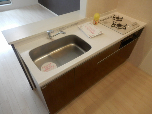 明石市魚住町清水のアパートのキッチン