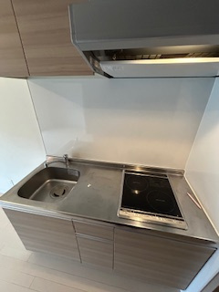 小西マンションのキッチン|コンパクトなキッチンで掃除もラクラク