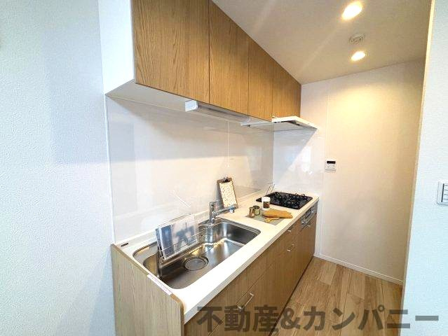 サンシティ市駅南のキッチン|コンパクトなキッチンで掃除もラクラク