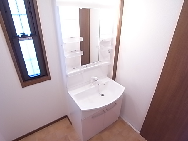 神戸市垂水区下畑町のアパートの洗面所