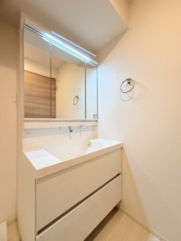 ベルプラージュ魚住の洗面所