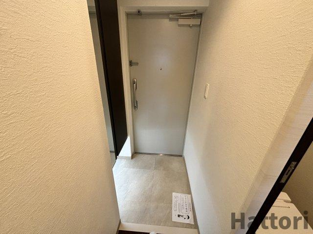 ファーストフィオーレ江坂レガリスの玄関