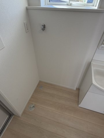 塩尻市塩尻町第10　3号棟のランドリースペース