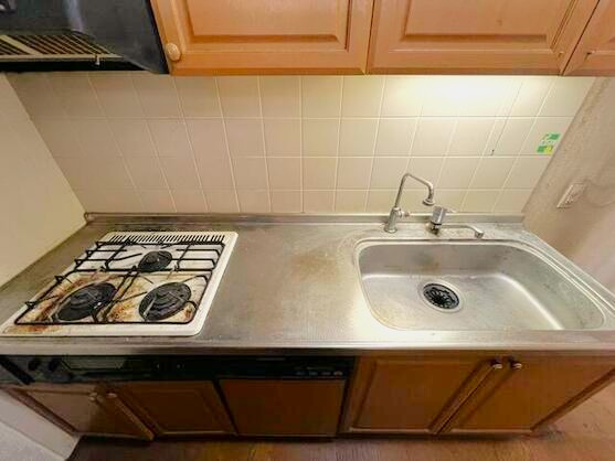 伊東シーサイドセンチュリー21のキッチン|コンパクトで収納のあるキッチン