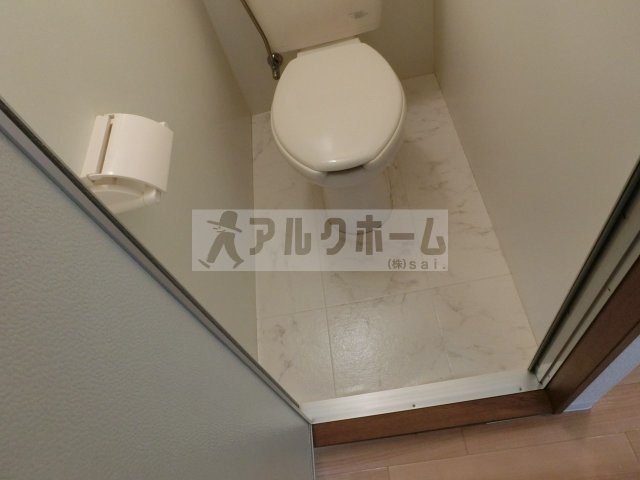 柏原市国分本町３丁目の賃貸マンションのトイレ