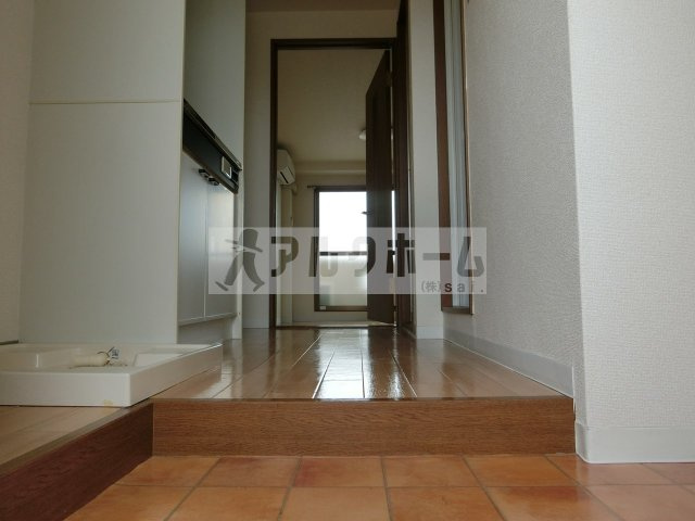 柏原市国分本町３丁目の賃貸マンションの玄関