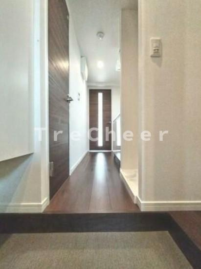 エスジーコート王子の玄関