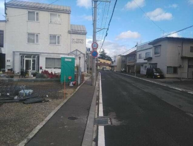 クレイドルガーデン八戸市小中野第7　4号棟の前面道路含む現地写真