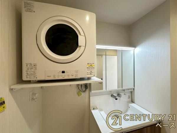 香芝市真美ケ丘５丁目 ／新築一戸建のその他|■現地撮影写真■洗面室には乾太くんが標準仕様で設置されています！