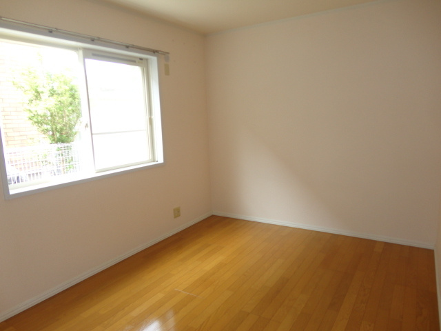 グランアベニュー真美Bの寝室