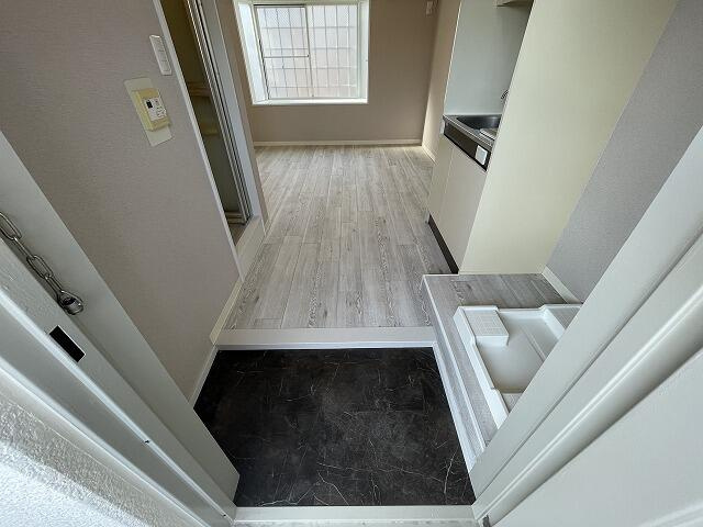 ホームズ稲田堤の玄関