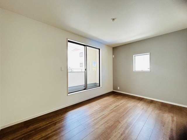 LG八重瀬町具志頭〈8号棟〉の洋室