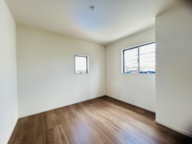 LG八重瀬町具志頭〈8号棟〉の洋室