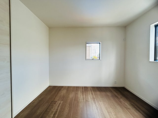 LG八重瀬町具志頭〈8号棟〉の洋室