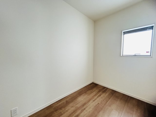 LG八重瀬町具志頭〈8号棟〉の洋室