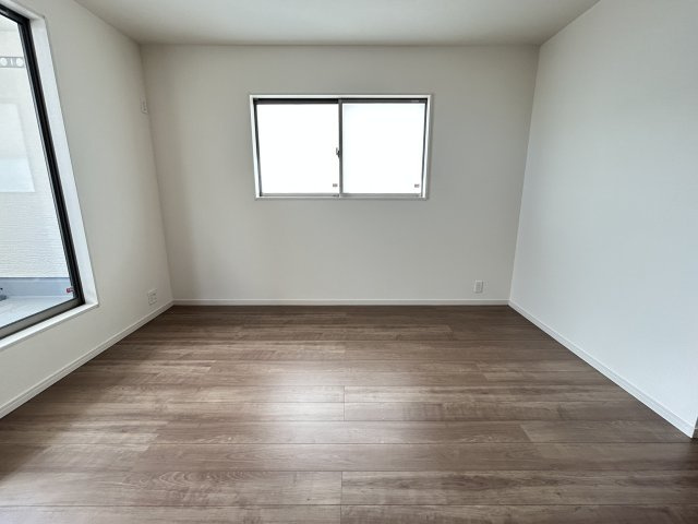 LG八重瀬町具志頭〈１０号棟〉の洋室