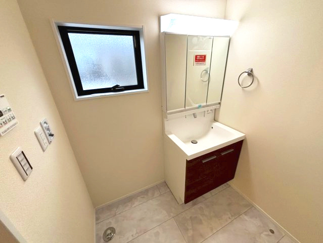 大明丘1丁目　新築戸建ての洗面所