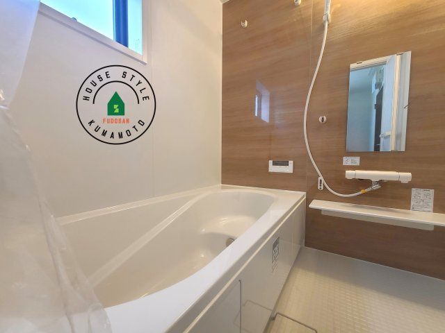 熊本市南区田井島2丁目第1₋2棟(1号棟)の内観：施工例|1日の疲れを癒してくれる広々バスルーム。雨の日のお洗濯にも大活躍な浴室乾燥機付です！