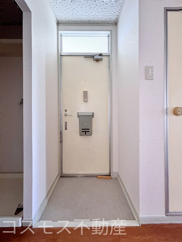 プレジール吟風の玄関