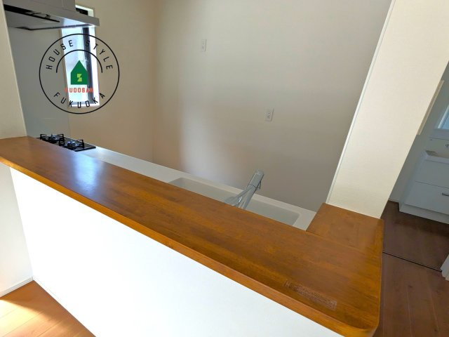 糟屋郡須恵町大字須恵第23-2棟（1号棟）の内観：施工例|キッチンから立ち込める香りが今日の料理を期待させます。