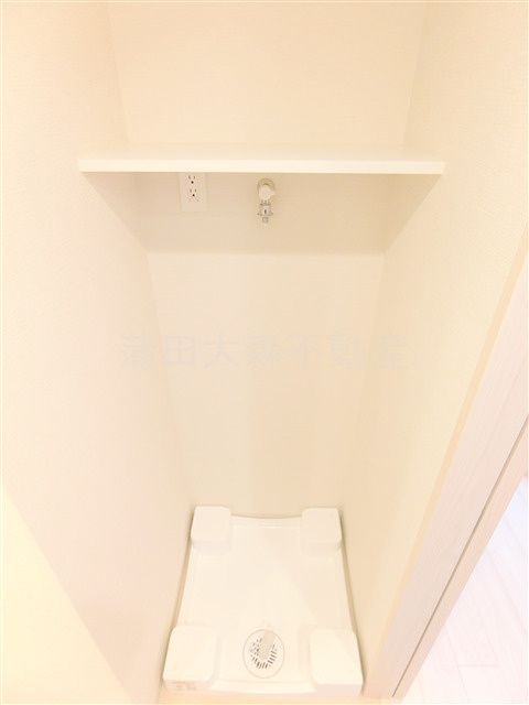 コンフォリア・リヴ西蒲田の設備|洗濯機置き場　棚付き