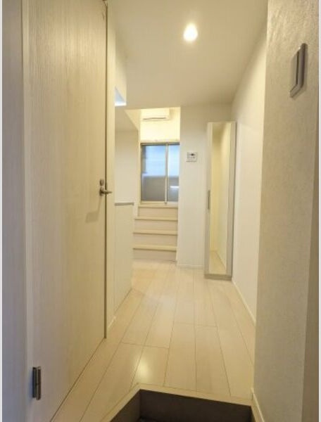 ハーモニーテラス六田の玄関