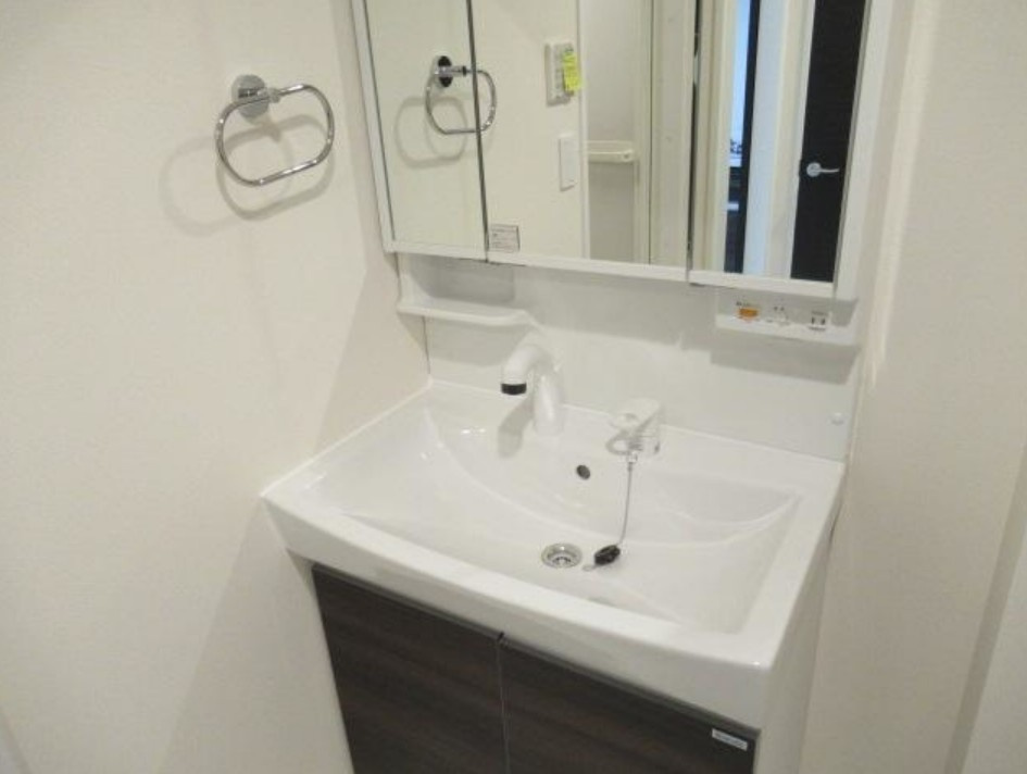 調布市多摩川４丁目の賃貸マンションの洗面所|施工会社イメージ写真