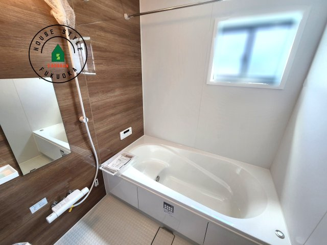 福岡市中央区笹丘1丁目第3-3棟（2号棟）の内観：施工例|1日の疲れを癒してくれる広々バスルーム。雨の日のお洗濯にも大活躍な浴室乾燥機付です！