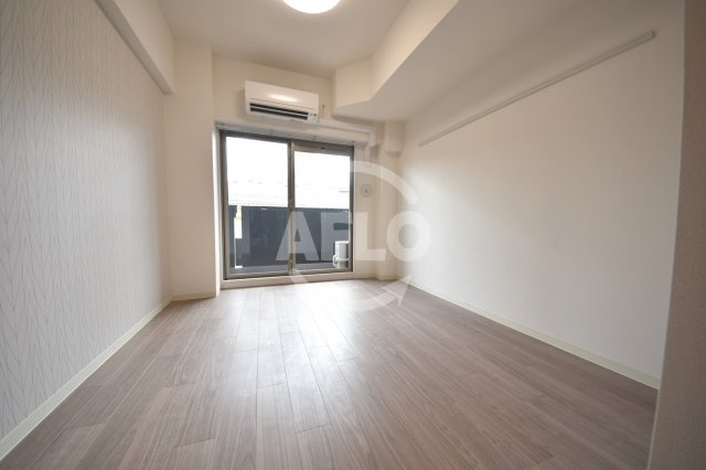 プレサンスOSAKA DOMECITYスクエアの居間・リビング|プレサンスOSAKA DOMECITYスクエア　洋室