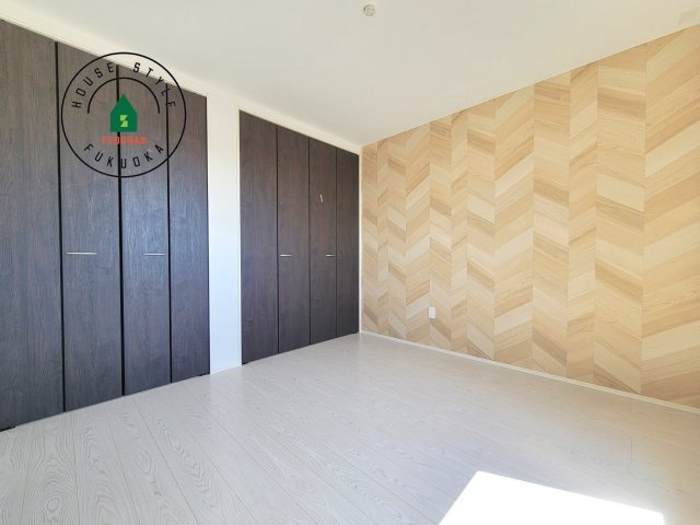 福岡市早良区原4丁目第1-2棟（1号棟）の内観：施工例|落ち着いた色調の洋室です。