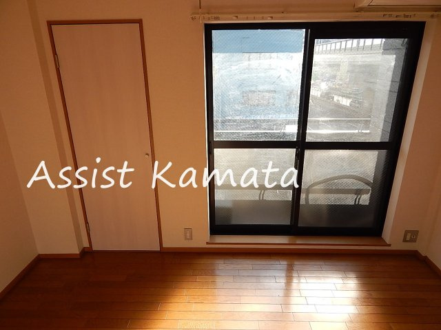 メゾン千明の洋室