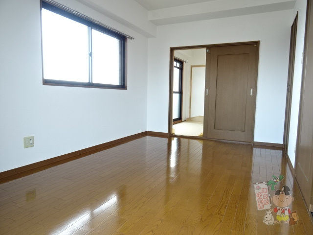 アリベ東古松の洋室